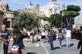 Couple of mexican tourists taking pictures in the streets of Rome, near Piazza Venezia. Rome,